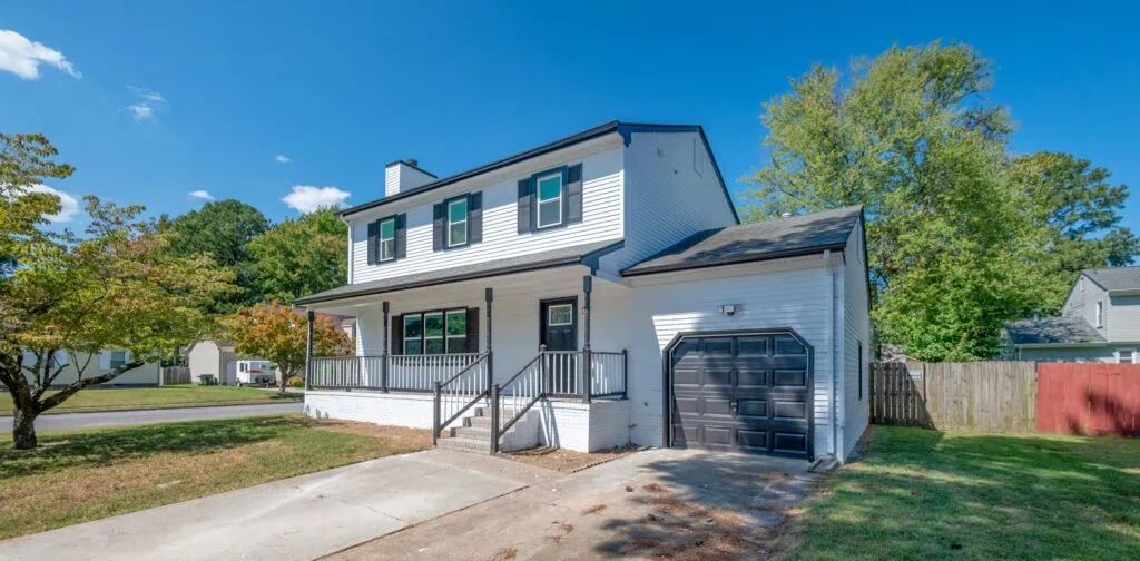 Front of a white home we purchased fast in Virginia Beach