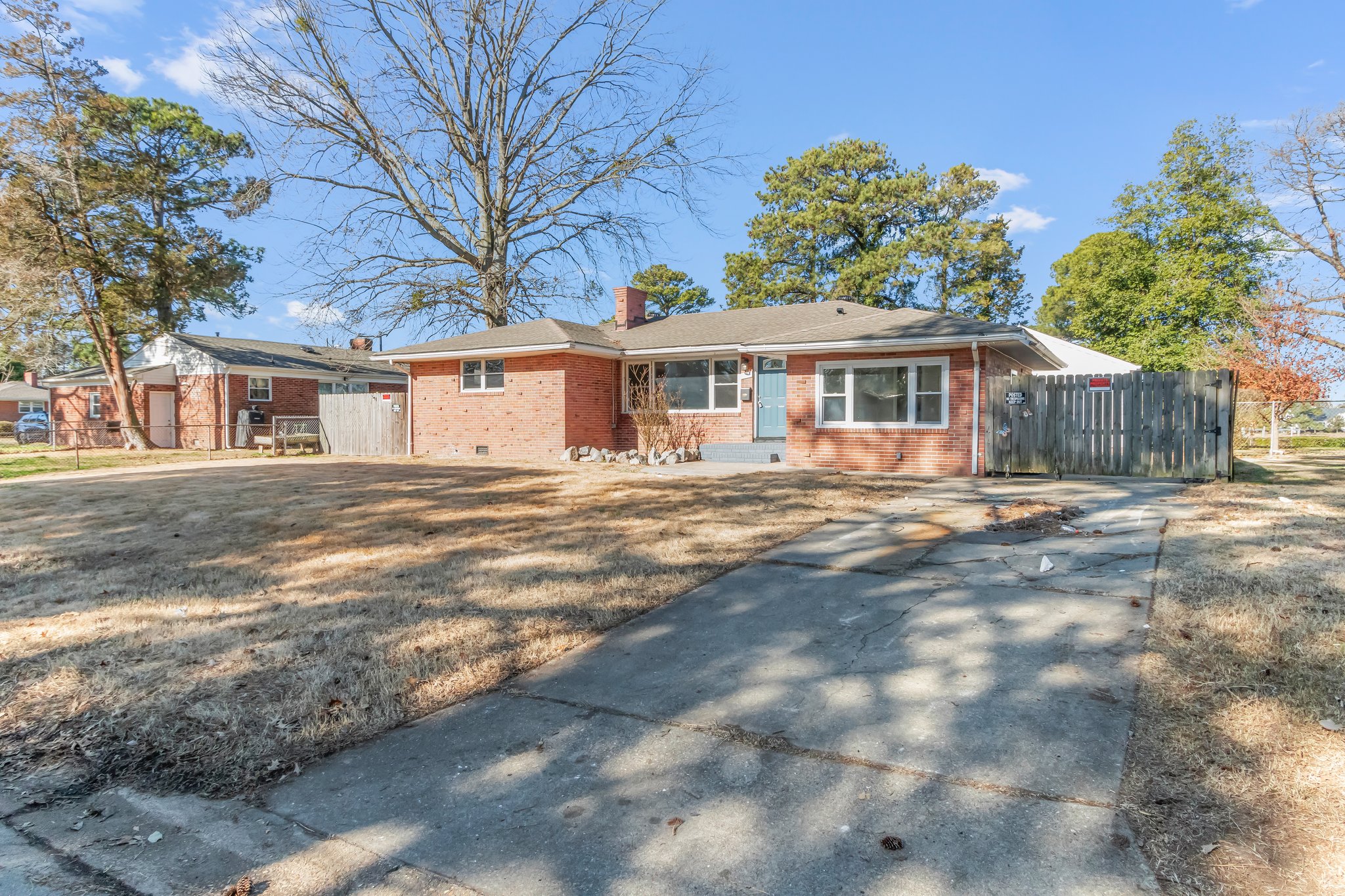 The front of a brick home in Norfolk, Virginia that we bought fast for cash