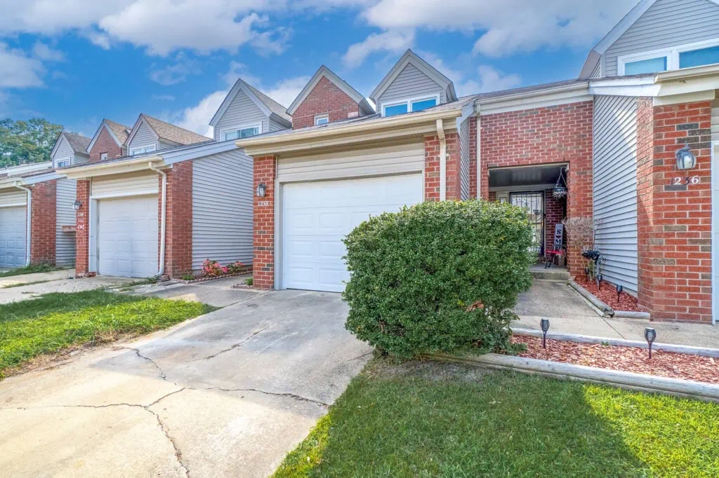 The front of a brick row home in Chesapeake