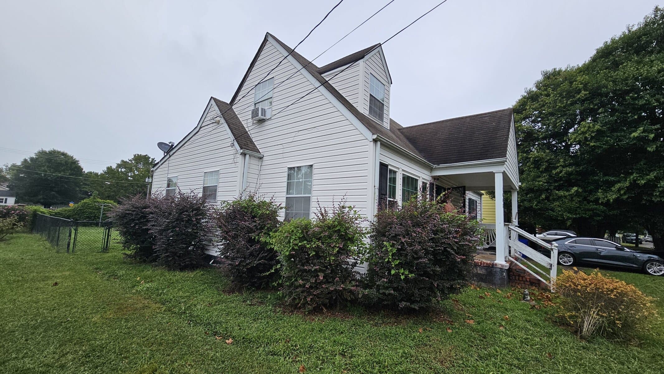 The side of a cape charles, virginia home that we bought fast for cash